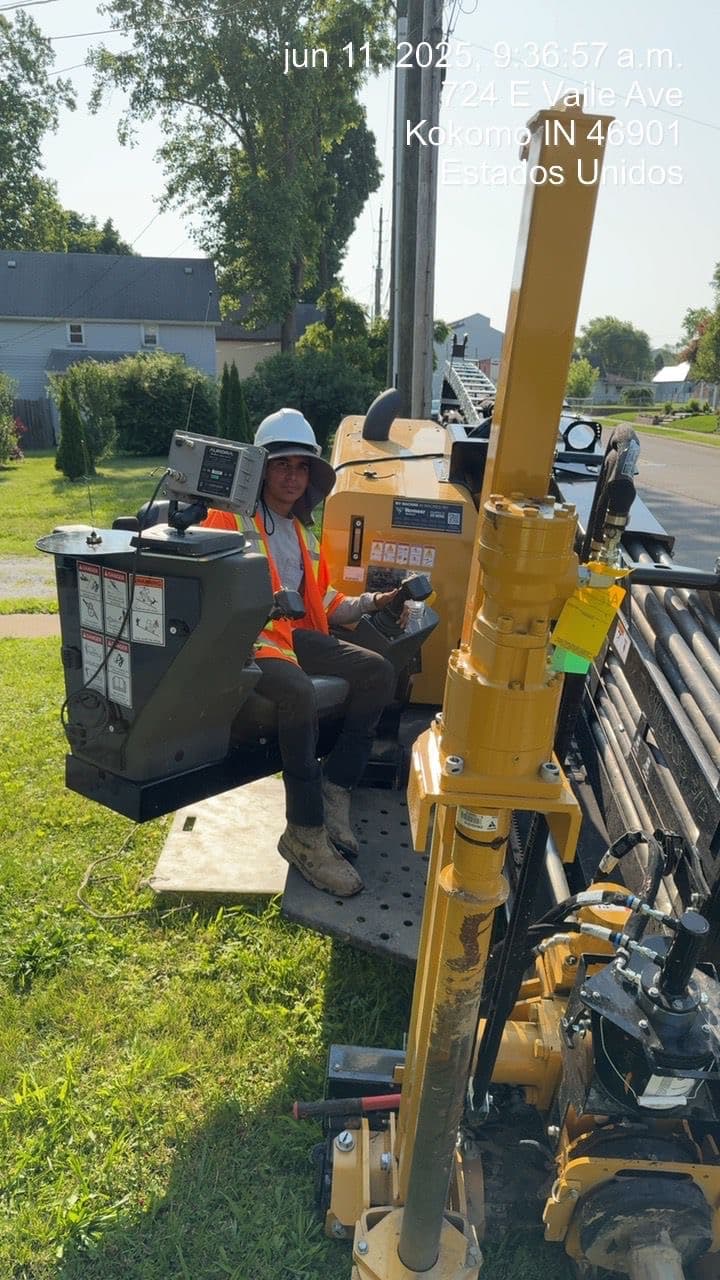 Drill operator at the controls of a directional drill in Kokomo, Indiana