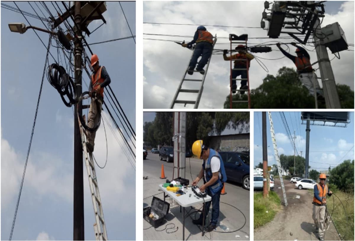 Crew members working aerial fiber on poles and ladders, with a technician splicing at a field table