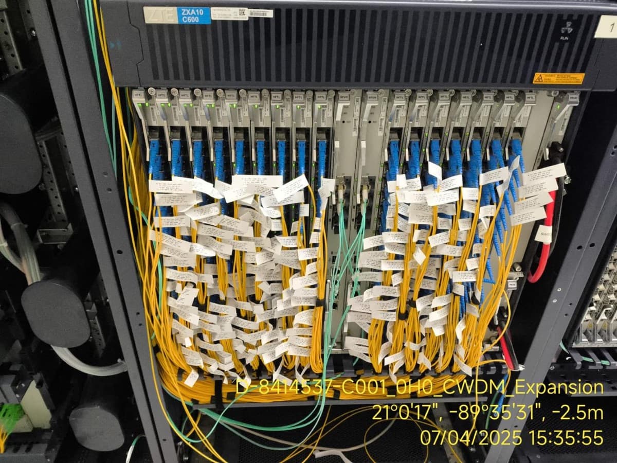ZTE ZXA10 C600 OLT with labeled fiber patch cords in a central office rack in Yucatán